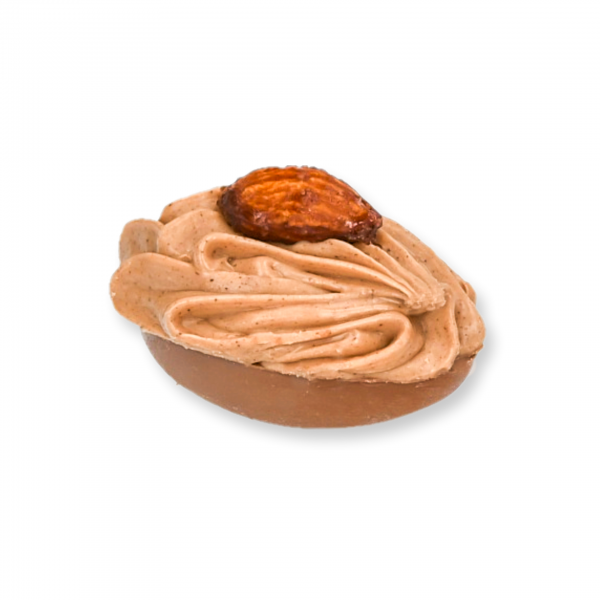 Vollmilch-Schokolade-Ei mit Pflaumen-Fülle und dressiertem Mandel- und Nussnougat